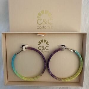 New In Box Medium sized ribbon wrapped hoop earrings.
Purple
Yellow
Blue
